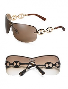 Rimless three-piece mount with marina chain temple. Available in gold frames with brown lens and chocolate frames with gray lens. Metal Made in Italy Rimless three-piece mount with marina chain temple. Available in gold frames with brown lens and chocolate frames with gray lens. Metal Made in Italy