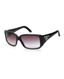 Introduced in the 1980s, the Prada triangle logo is the classic icon of the brand. This popular style has been updated in black and features a logo that is simply Prada. Lenses are rose and gradient. Introduced in the 1980s, the Prada triangle logo is the classic icon of the brand. This popular style has been updated in black and features a logo that is simply Prada. Lenses are rose and gradient.