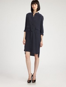 This modern silk shirtdress is tailored with a fluid, relaxed fit.Band collarFront button placket with detached tab detailButton patch flap pocketsLong sleeves with button cuffsVented asymmetrical hemlineGathers at back yokeAbout 26 from natural waist53% silk/47% acetateDry cleanImported of Italian fabricModel shown is 5'9 (175cm) wearing US size 4. 