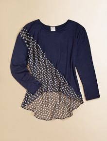 A not-so-basic, long-sleeved top gets a touch of trendy with hi-lo hem and polka dot chiffon panel.Round necklineLong sleevesPullover styleHigh-low hemRayon/spandex/polyesterHand washMade in the USA of imported fabric