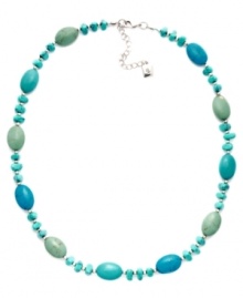 Stylishly Southwestern. Reconstituted turquoise beads adorn this eye-catching necklace from Lauren by Ralph Lauren. Whether you wear it to work or with more casual daytime outfits, it's sure to stand out as a chic complement. Crafted in mixed metal. Approximate length: 18 inches + 2-inch extender. Stylishly Southwestern. Reconstituted turquoise beads adorn this eye-catching necklace from Lauren by Ralph Lauren. Whether you wear it to work or with more casual daytime outfits, it's sure to stand out as a chic complement. Crafted in mixed metal. Approximate length: 18 inches + 2-inch extender.