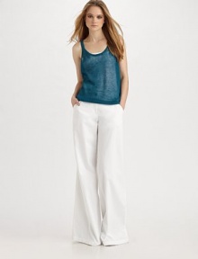 Low-key sheer linen in a simple style for warm days.Scoop neckline Ribbed trim Linen/spandex Dry clean Imported