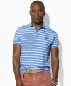 Classic stripes lend a crisp, polished look to a relaxed-fitting polo shirt in breathable cotton mesh.