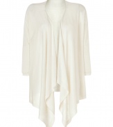 Dramatic with its long draped front and flattering cropped silhouette, DKNYs pristine cardigan lends a chic edge to any outfit - Oversized shawl collar, 3/4 sleeves, fine ribbed trim, open front - Cropped silhouette, form-fitting - Wear over fitted dresses with sleek statement pumps
