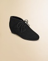 Cool lace-up suede booties elevated by a covered wedge heel.Laced-front style with skinny lacesSuede upper2 covered wedge heelFabric liningRubber soleImportedAdditional InformationKid's Shoe Size Guide (European Equivalent) 