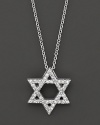 A diamond Star of David in a white gold setting. With a delicate white gold chain.