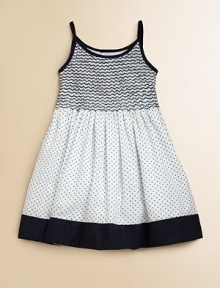 Crafted in plush cotton, this fancy frock's smocked bodice, full skirt and perky polka dots complete the look.Spaghetti strapsRound necklineButton backSmocked bodiceBack tie waistFull skirtFully linedCottonMachine wash coldImported Please note: Number of buttons may vary depending on size ordered. Crafted in plush cotton, this fancy frock's smocked bodice, full skirt and perky polka dots complete the look.Spaghetti strapsRound necklineButton backSmocked bodiceBack tie waistFull skirtFully linedCottonMachine wash coldImported Please note: Number of buttons may vary depending on size ordered.