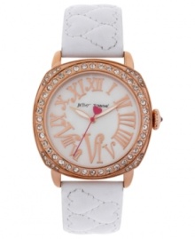 Fashion that warms your heart. This darling watch from Betsey Johnson shines with sparkling crystals and rose-gold tones.