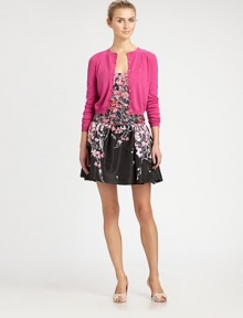 Sumptuous cashmere sweater in an abbreviated silhouette, finished with a shimmering silk finish. RoundneckButton frontLong sleevesAbout 17 from shoulder to hem70% cashmere/30% silkDry cleanImportedSIZE & FITModel shown is 5'10 (177cm) wearing US size Small. Sumptuous cashmere sweater in an abbreviated silhouette, finished with a shimmering silk finish. RoundneckButton frontLong sleevesAbout 17 from shoulder to hem70% cashmere/30% silkDry cleanImportedSIZE & FITModel shown is 5'10 (177cm) wearing US size Small.