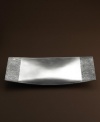 Redefining sophistication, Vera Wang's collection of serveware and serving dishes marries modern geometry and classic elegance with the Vesta oblong platter. Sharp lines and traditional ribbing detail combine for a unique, segmented pattern.