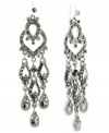 Decorative drops. Embellished with sparkling acrylic accents, 2028's ornate drop earrings have an eye-catching effect. Crafted in hematite tone mixed metal, they'll look equally chic for daytime or evening. Approximate drop: 3 inches.