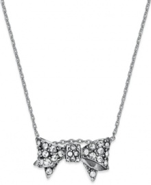 Make a wish! This darling bow pendant necklace from Juicy Couture gleams with crystal accents and endless appeal. Crafted in silver tone mixed metal. Approximate length: 18 inches + 3-inch extender. Approximate drop: 3/4 inch.