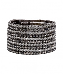 Inject instant glamour into any outfit with R.J.Grazianos set of stretchy bangles, a chic and easy choice for dressing up your look - Prong set stones, slips on - Wear with edgy separates, or as a finishing touch to cocktail dresses