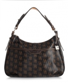 Dooney & Bourke's Collins shoulder bag goes with everything, in a chic 1975-themed signature print. Dooney & Bourke's Collins shoulder bag goes with everything, in a chic 1975-themed signature print.