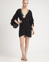A sophisticated design with a flattering v-neckline and romantic ruffle sleeves. V-neckLong ruffle sleevesSelf-tieCord endsRayonHand washImported