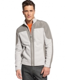 Get your style on track with this sporty mock neck jacket by INC International Concepts.