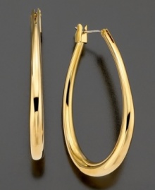 Adorn your ears with the classically romantic teardrop shape of these fine hoop earrings from Lauren by Ralph Lauren. In goldtone mixed metal. Approximate drop: 1-1/2 inches.