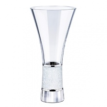 With flowers, this crystal vase brings infinite beauty to your home. The crystalline center with thousands of glittering chatons adds sheer brilliance to your floral arrangement. The sturdy base of faceted clear crystal shines elegantly. With flowers, this crystal vase brings infinite beauty to your home. The crystalline center with thousands of glittering chatons adds sheer brilliance to your floral arrangement. The sturdy base of faceted clear crystal shines elegantly.