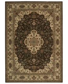 Distinctive flair with roots in Persian design. This exquisitely ornate area rug is abound in deep, sumptuous chocolate tones, highlighted by a dramatic central medallion, and crafted from Nourison's own Opulon™ yarns for a densely woven pile with long-lasting color retention and durability.