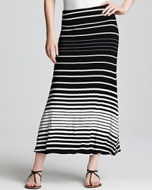 Thoroughly hypnotic, variegated black and white stripes give this Karen Kane maxi skirt a futuristic feel. Keep the style strong with a neon tank. Thoroughly hypnotic, variegated black and white stripes give this Karen Kane maxi skirt a futuristic feel. Keep the style strong with a neon tank.