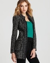 Nanette Lepore's knit coat is the perfect top layer to your fall looks. Exposed zips lend modern edge.