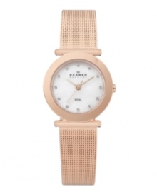 Skagen Denmark's signature mesh stuns with rose-gold warmth. Rose-gold-plated stainless steel bracelet and round case. White mother-of-pear dial features crystal accents at markers, three rose-gold tone hands and logo. Quartz movement. Water resistant to 30 meters. Limited lifetime warranty. Skagen Denmark's signature mesh stuns with rose-gold warmth. Rose-gold-plated stainless steel bracelet and round case. White mother-of-pear dial features crystal accents at markers, three rose-gold tone hands and logo. Quartz movement. Water resistant to 30 meters. Limited lifetime warranty.