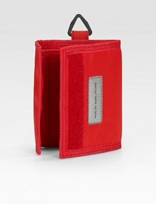 Simply and sporty in durable nylon with a grip-tape closure and handy key ring. Grip-tape closure One bill compartment Card slots Nylon 5 X 4 Imported Simply and sporty in durable nylon with a grip-tape closure and handy key ring. Grip-tape closure One bill compartment Card slots Nylon 5 X 4 Imported
