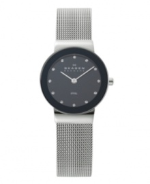 Timeless design with contemporary appeal, by Skagen Denmark. Watch crafted of stainless steel mesh bracelet and round case with mirrored bezel. Black dial features crystal accents at markers, two silver tone hand and logo. Quartz movement. Water resistant to 30 meters. Limited lifetime warranty. Timeless design with contemporary appeal, by Skagen Denmark. Watch crafted of stainless steel mesh bracelet and round case with mirrored bezel. Black dial features crystal accents at markers, two silver tone hand and logo. Quartz movement. Water resistant to 30 meters. Limited lifetime warranty.