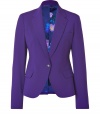 A structured blazer adds a touch of tailored chic to any wardrobe, and this purple jacket from Paul Smith positively pops - Slim, feminine cut tapers through waist - Small collar and medium width lapels - Elegant, single button closure and two flap pockets - Vent at rear - Lush, floral print lining in rich shades of violet and blue - Seamlessly transitions from work to evening cocktails, parties and dinners - Pair with leather pants or pencil skirts, skinny dark denim or suit trousers