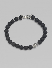 A striking collection of onyx beads are laced alongside a sterling silver accent and matching closure. From the Spiritual Bead Collection 8mm onyx beads Sterling silver Bracelet length, about 8½ Sterling silver clasp Imported A striking collection of onyx beads are laced alongside a sterling silver accent and matching closure. From the Spiritual Bead Collection 8mm onyx beads Sterling silver Bracelet length, about 8½ Sterling silver clasp Imported