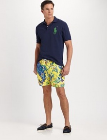 Exude iconic style in a heritage Big Pony polo shirt, crafted from breathable cotton mesh in a relaxed, classic fit.Two-button placketEmbroidered Big Pony chest accent Applied 3 on right sleeveCottonMachine washImported Exude iconic style in a heritage Big Pony polo shirt, crafted from breathable cotton mesh in a relaxed, classic fit.Two-button placketEmbroidered Big Pony chest accent Applied 3 on right sleeveCottonMachine washImported