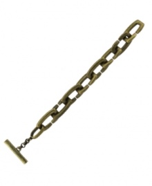 Incorporate a little vintage flavor into your style. Vince Camuto's stylish Kiss Bracelet features a small link design in brass tone mixed metal. Approximate length: 8 inches.