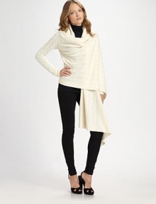 Subtly draped Italian wool and cashmere with cable-knit construction that exudes modern elegance. Draped open frontLong dolman sleevesRibbed cuffs and hemAsymmetrical cropped back hem80% wool/20% cashmereDry cleanImported of Italian fabric