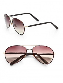 These covered metal frames feature snakeskin covered arms. Available in dark tortoise/gold with brown lens. 100% UV protectionImported These covered metal frames feature snakeskin covered arms. Available in dark tortoise/gold with brown lens. 100% UV protectionImported