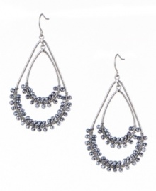 Kenneth Cole New York's oval-shaped double-drop earrings are delicately decorated with pretty pale blue seed beads. Crafted in hematite tone mixed metal. Approximate drop: 2 inches.