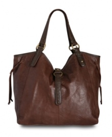Light as feather: this boho-chic leather purse from Lucky Brand is subtly embossed with a feather design and embellished with top-stitched straps and antiqued hardware. The slouchy silhouette ramps up the trend factor. Light as feather: this boho-chic leather purse from Lucky Brand is subtly embossed with a feather design and embellished with top-stitched straps and antiqued hardware. The slouchy silhouette ramps up the trend factor.