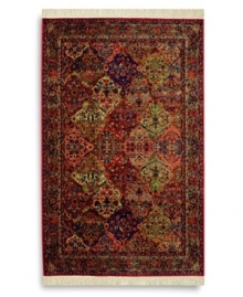 A long runner that is ideal for halls and entryways, this intensly colored rug recalls the graceful style and bold design of original Kirman rugs woven in ancient Persia. Comprised of 50, individually-dyed colors to create a stunning depth of texture and hue. A patented luster-wash imparts an elegant vintage look and feel. Woven in the USA of premium fully worsted New Zealand wool.