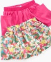 A bit modest. She can feel girlie and still stay covered up in this skirt with shorts built-in underneath from DKNY.