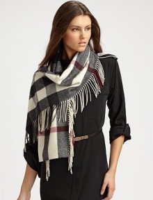 A large check print in a warm wool with long fringe detail. WoolAbout 10 X 61Dry cleanMade in Italy A large check print in a warm wool with long fringe detail. WoolAbout 10 X 61Dry cleanMade in Italy