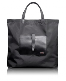 Your go-to in a moment's notice! Rolling up to a compact size that fits easily into other bags, this essential tote is on call whenever you need it. A lightweight nylon exterior and front leather pocket inject style into every day. Five-year warranty. Your go-to in a moment's notice! Rolling up to a compact size that fits easily into other bags, this essential tote is on call whenever you need it. A lightweight nylon exterior and front leather pocket inject style into every day. Five-year warranty.