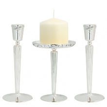 Like her exquisite jewel-encrusted gowns, Monique Lhuillier's unity candle set features just the right amount of sparkling accents. Modern yet romantic, the delicate crystal-embellished design is perfect for wedding ceremonies and all the days that follow. Like her exquisite jewel-encrusted gowns, Monique Lhuillier's unity candle set features just the right amount of sparkling accents. Modern yet romantic, the delicate crystal-embellished design is perfect for wedding ceremonies and all the days that follow.