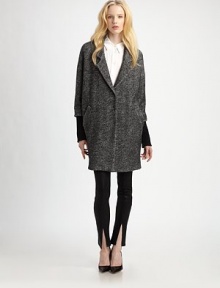 Sculptural and chic, tailored with menswear-inspired details and rendered in a bi-color cotton/wool blend tweed.Notched lapelsSnap front closuresThree-quarter sleevesSide welt pocketsFully linedAbout 35 from shoulder to hem60% cotton/40% woolDry cleanImportedModel shown is 5'10 (177cm) wearing US size Small. Sculptural and chic, tailored with menswear-inspired details and rendered in a bi-color cotton/wool blend tweed.Notched lapelsSnap front closuresThree-quarter sleevesSide welt pocketsFully linedAbout 35 from shoulder to hem60% cotton/40% woolDry cleanImportedModel shown is 5'10 (177cm) wearing US size Small.