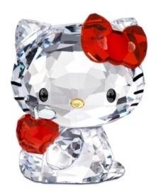 Cuter than ever, Hello Kitty clutches a shiny red apple in this irresistible Swarovski crystal figurine. With printed whiskers and her trademark red bow. Cuter than ever, Hello Kitty clutches a shiny red apple in this irresistible Swarovski crystal figurine. With printed whiskers and her trademark red bow.