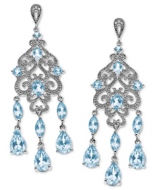 Truly spectacular sparkle. Light up the night with these luminous chandelier earrings in marquise, oval and round-cut blue topaz (8-1/4 ct. t.w.) with sparkling diamond accents. Set in sterling silver. Approximate drop: 2-1/8 inches. Truly spectacular sparkle. Light up the night with these luminous chandelier earrings in marquise, oval and round-cut blue topaz (8-1/4 ct. t.w.) with sparkling diamond accents. Set in sterling silver. Approximate drop: 2-1/8 inches.