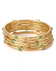 The easiest way to shine on - and the perfect accent to any look. We're wearing this set of hammered gold plated bangles from Lauren Ralph Lauren, stylishly stacked. The easiest way to shine on - and the perfect accent to any look. We're wearing this set of hammered gold plated bangles from Lauren Ralph Lauren, stylishly stacked.