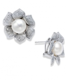 A true beauty. A cultured freshwater pearl (10 mm) and sparkling round-cut diamonds (1/10 ct. t.w.) adorn these exquisite flower-shaped stud earrings. Set in sterling silver. Approximate diameter: 1 inch. A true beauty. A cultured freshwater pearl (10 mm) and sparkling round-cut diamonds (1/10 ct. t.w.) adorn these exquisite flower-shaped stud earrings. Set in sterling silver. Approximate diameter: 1 inch.
