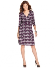 A deco-inspired print adds graphic punch to a sophisticated wrap petite dress from AGB. Pair it with heels and eye-catching jewelry for a look that takes you seamlessly from a day at the office to an evening out. A deco-inspired print adds graphic punch to a sophisticated wrap petite dress from AGB. Pair it with heels and eye-catching jewelry for a look that takes you seamlessly from a day at the office to an evening out.
