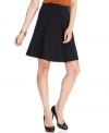Nine West puts a modern spin on a classic skirt: an elegant silhouette gets a fresh look with an inverted pleat in front.