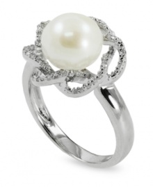Beauty is in full bloom. This sterling silver ring features a cultured freshwater pearl (9-10 mm) surrounded by a diamond (1/10 ct. t.w.) flower for an elegant touch. Size 7. Beauty is in full bloom. This sterling silver ring features a cultured freshwater pearl (9-10 mm) surrounded by a diamond (1/10 ct. t.w.) flower for an elegant touch. Size 7.