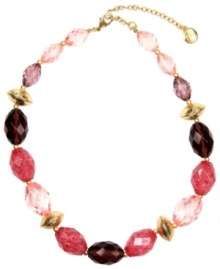 Pink appeal. Jones New York's chic collar necklace combines an array of light-to-dark pink plastic beads. Gold-plated mixed metal accent beads and lobster claw clasp add a touch of polish. Approximate length: 17 inches + 2-inch extender.